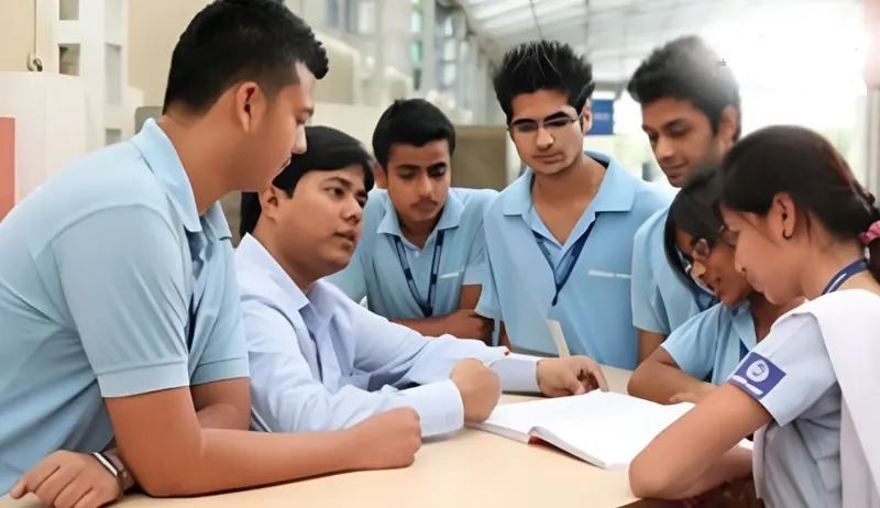 Students working through a problem together