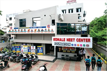 The Konale NEET Center with students walking in
